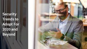 Man wearing mask and reading security trends for 2020.
